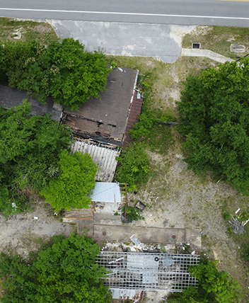 Top view of a property after being hit by a hurricane